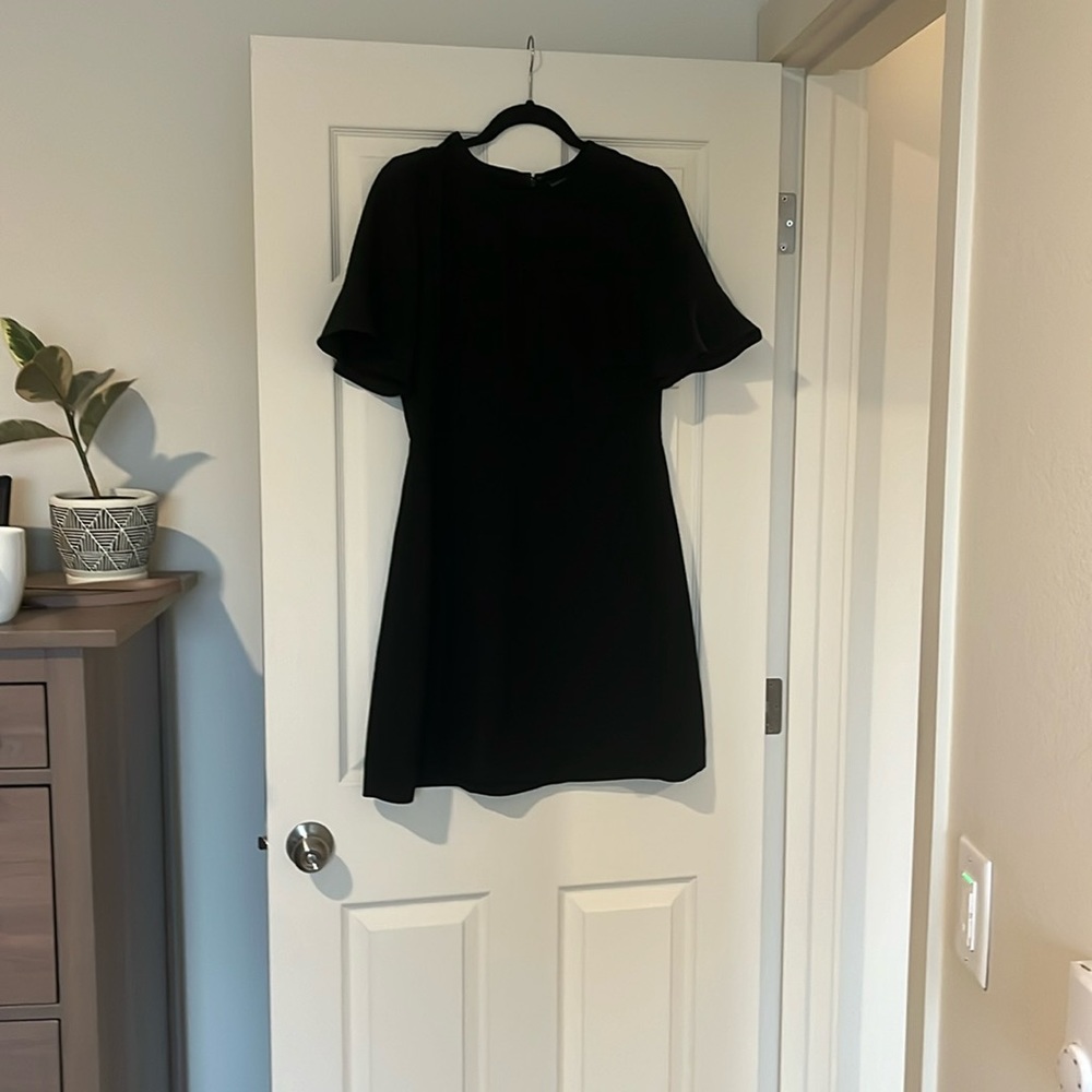 Banana Republic black dress. Size 8. Not used often, so good condition.